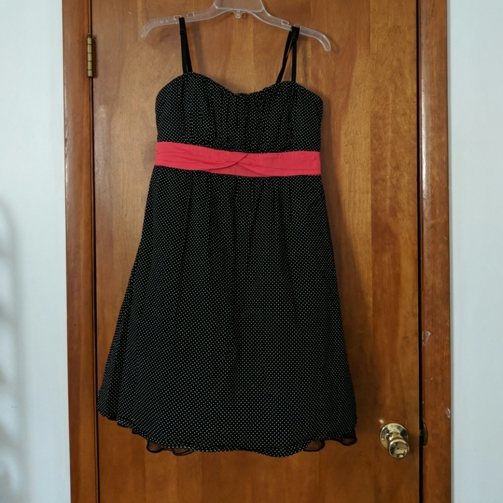 Polka dot dress with red sash